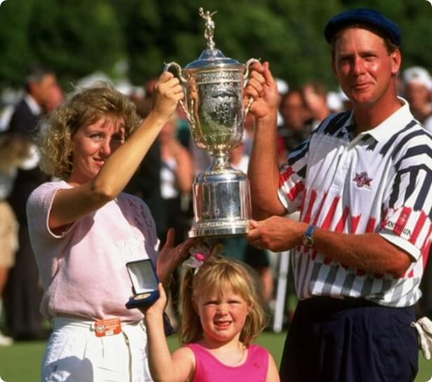 Payne Stewart with trophy and his family